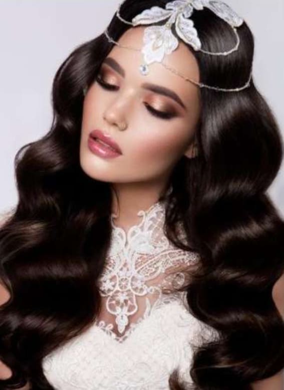 A girl with bohemian-glam waves and a stunning headpiece is the ideal choice to be a bridesmaid.